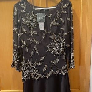 Bought at macys, very perfect for attending a wedding with, and fancy outings :)